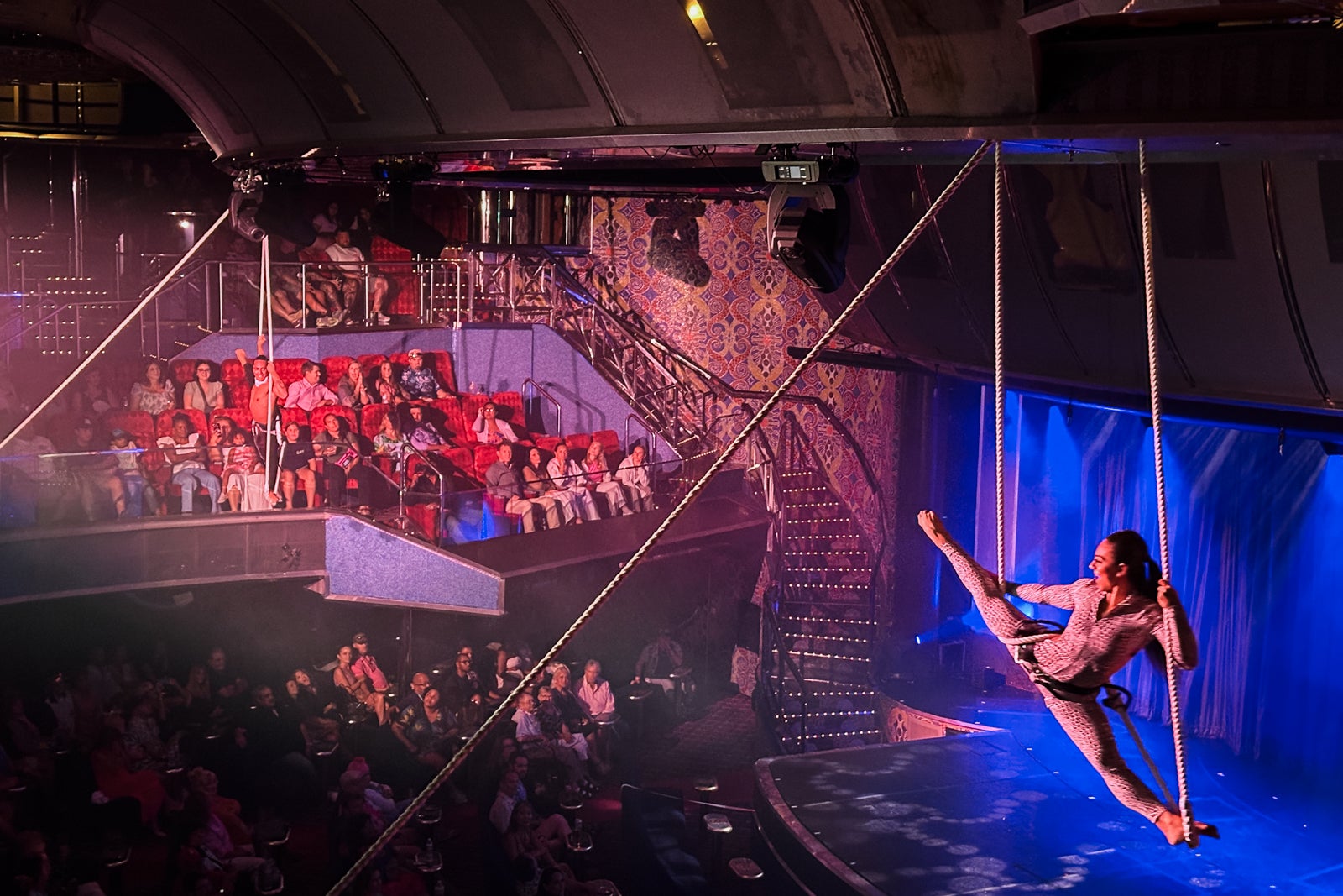 An acrobat performs during a cruise ship show