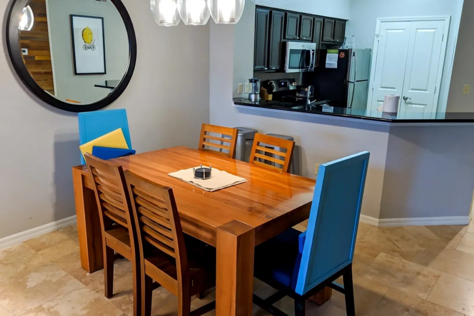 Kitchen and dining area at Bluegreen Vacations Fountains, Ascend Resort Collection, in Florida