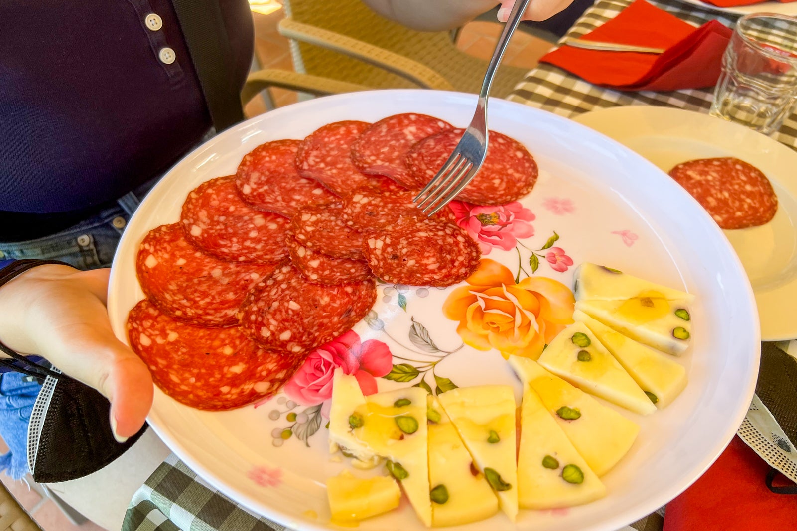 A plate of pepperoni and cheese