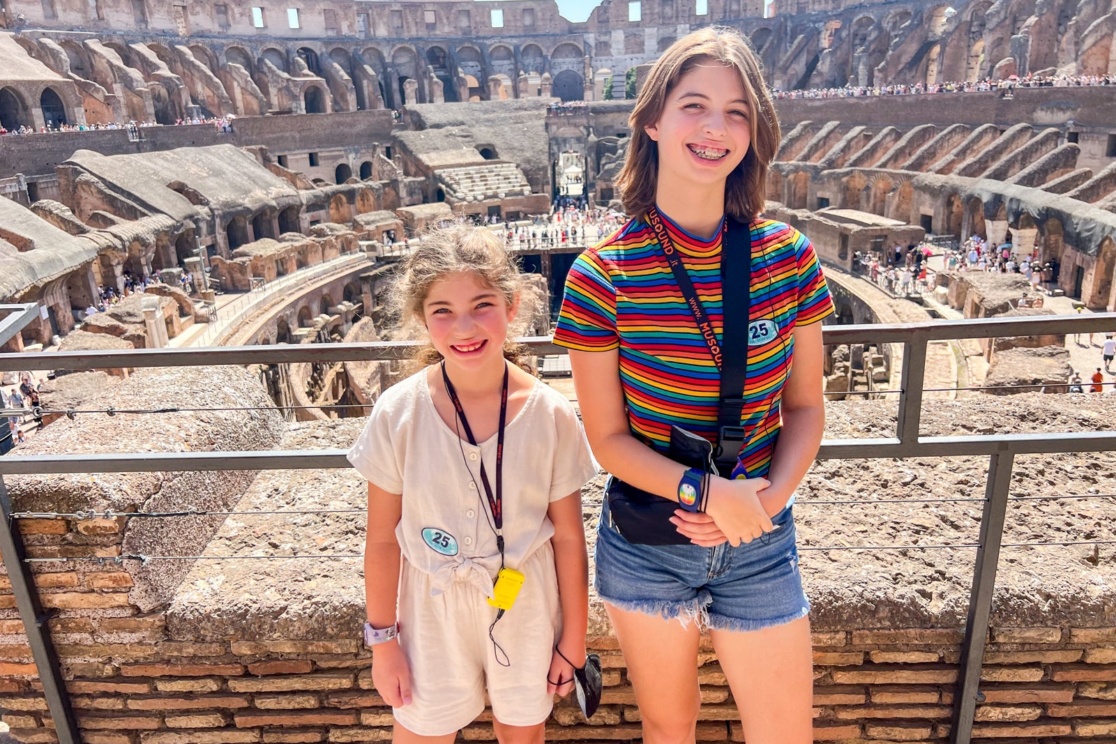 Two girls posing at the Colosseum in Rome, Italy