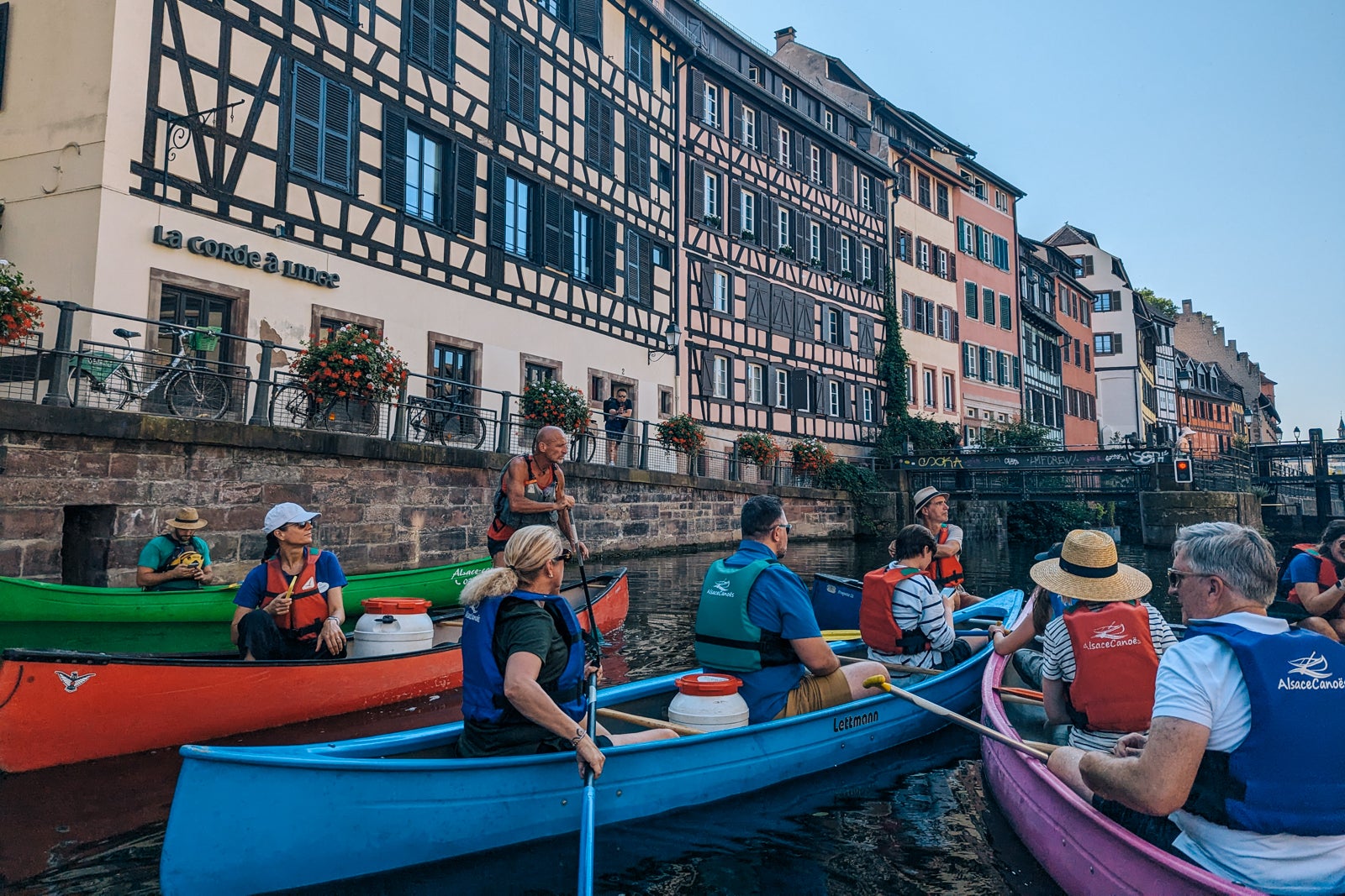 people kayaking in the river in Strasbourg