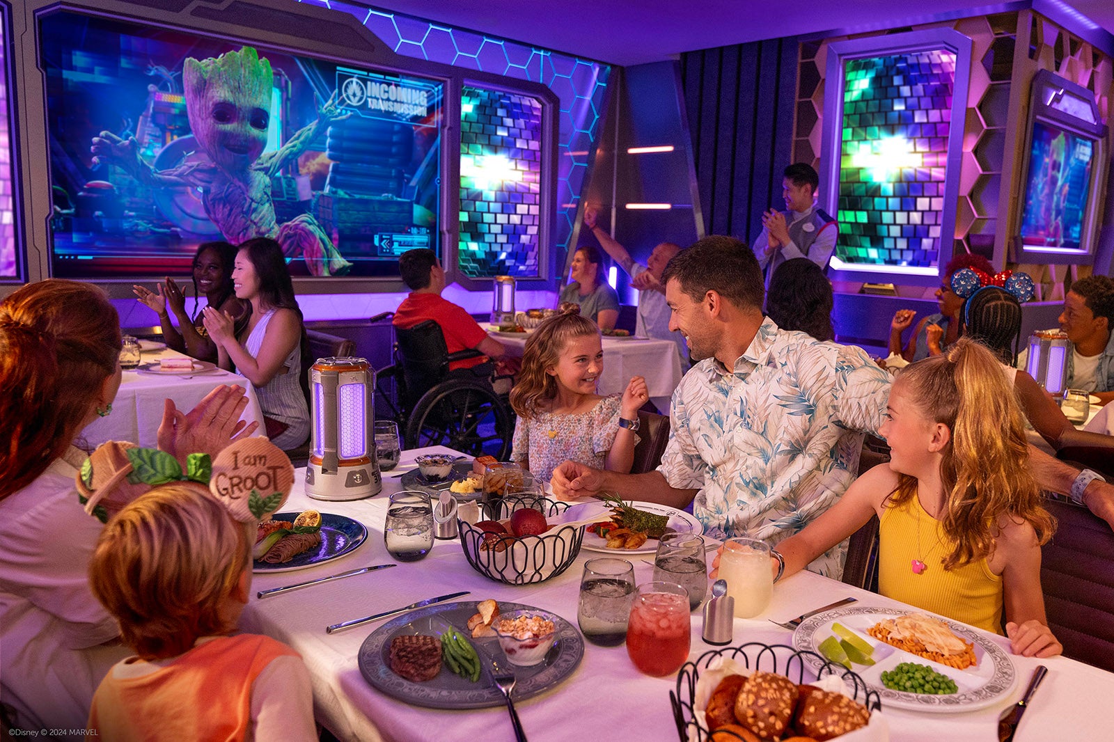 Passengers dining at a restaurant on a Disney Cruise Line ship