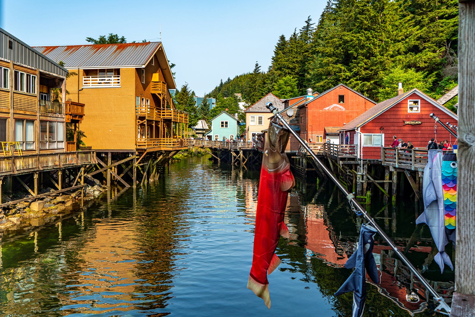 A view of Creek Street in Ketchikan, Alaska, featuring colorful buildings on stilts