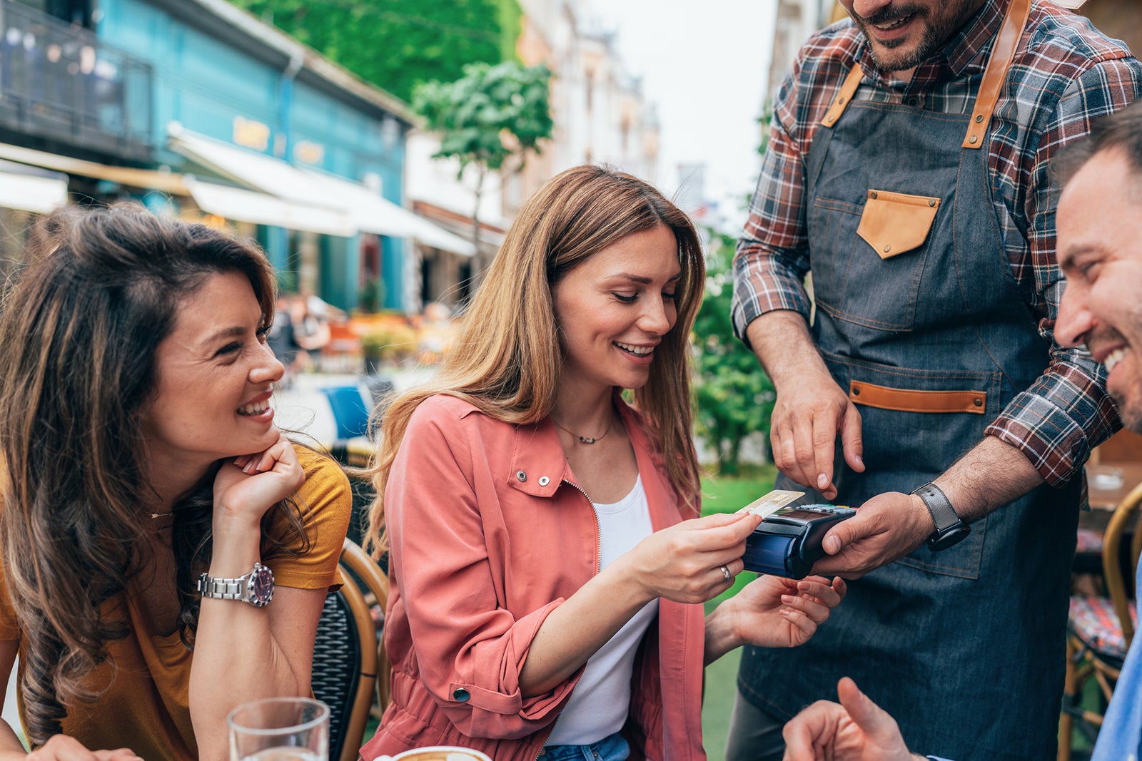 Woman paying with a credit card