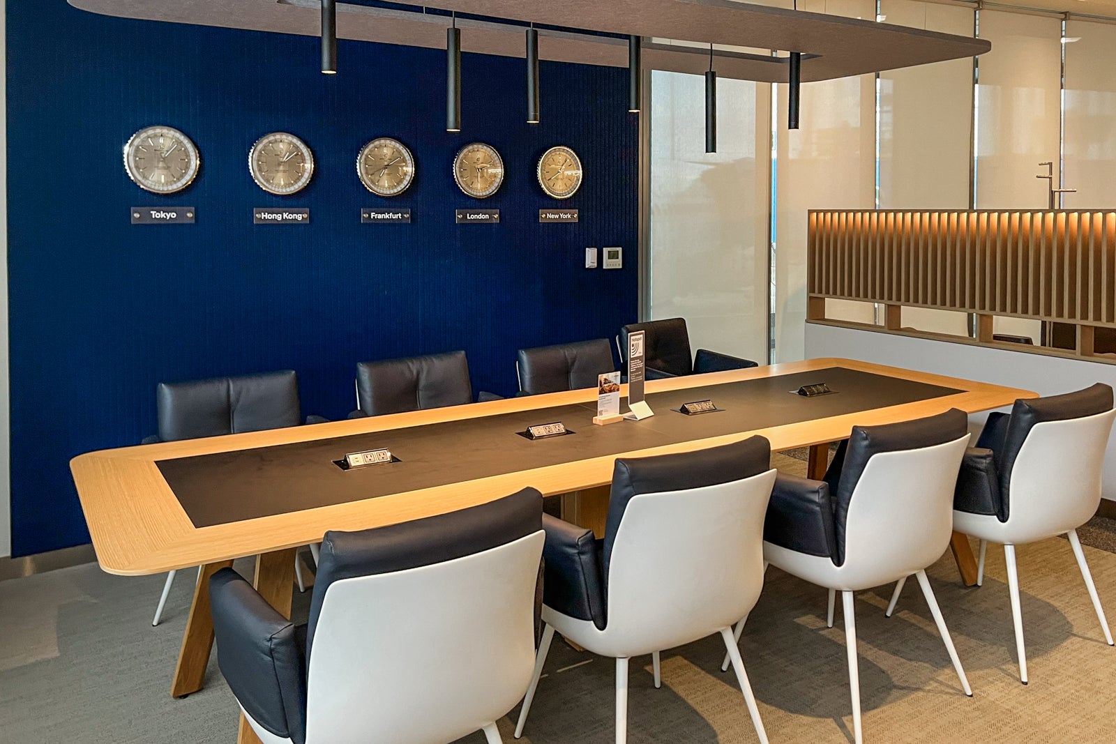 Conference table area of the Lufthansa lounge at Newark Liberty International Airport