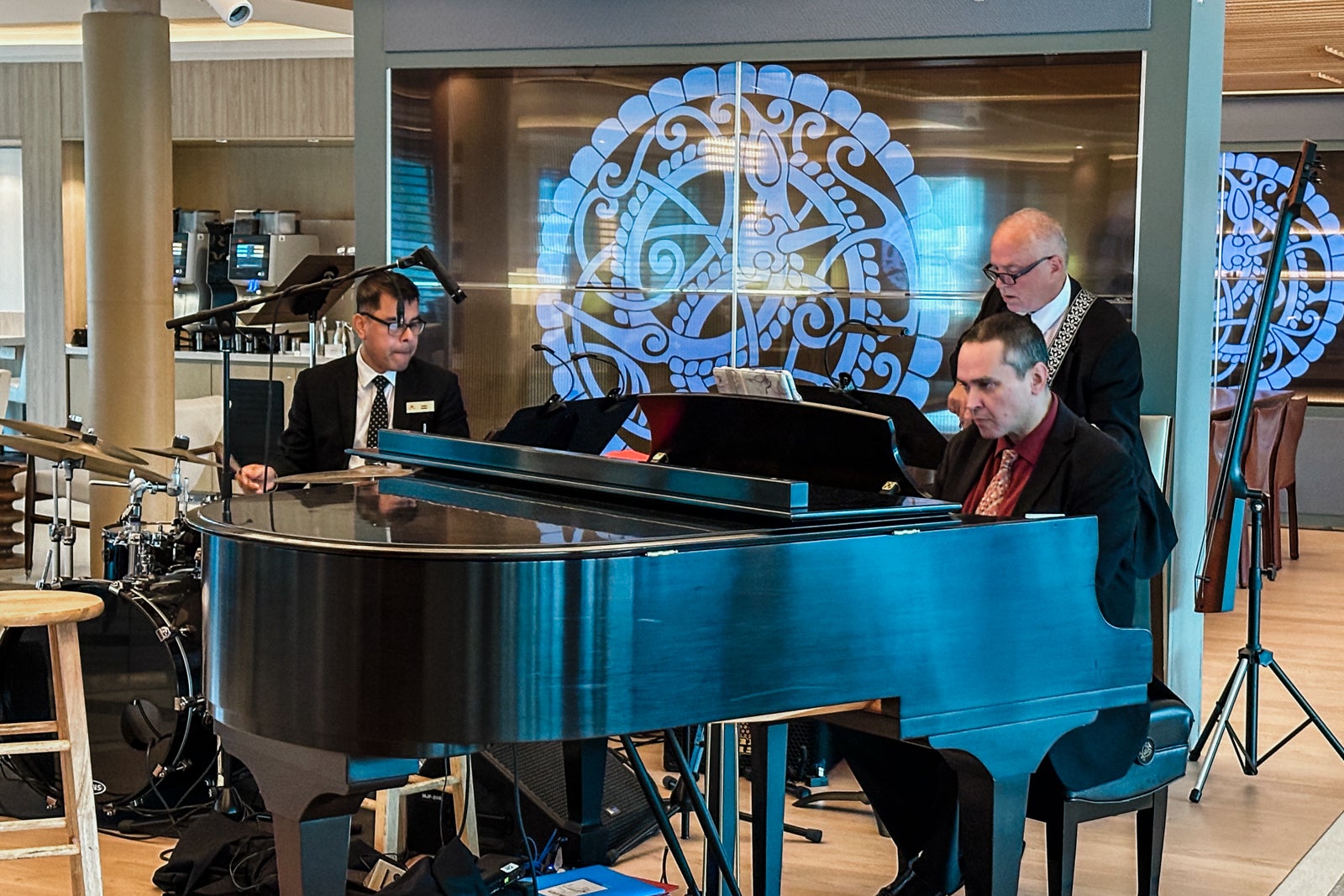 A group of musicians performs on a cruise ship