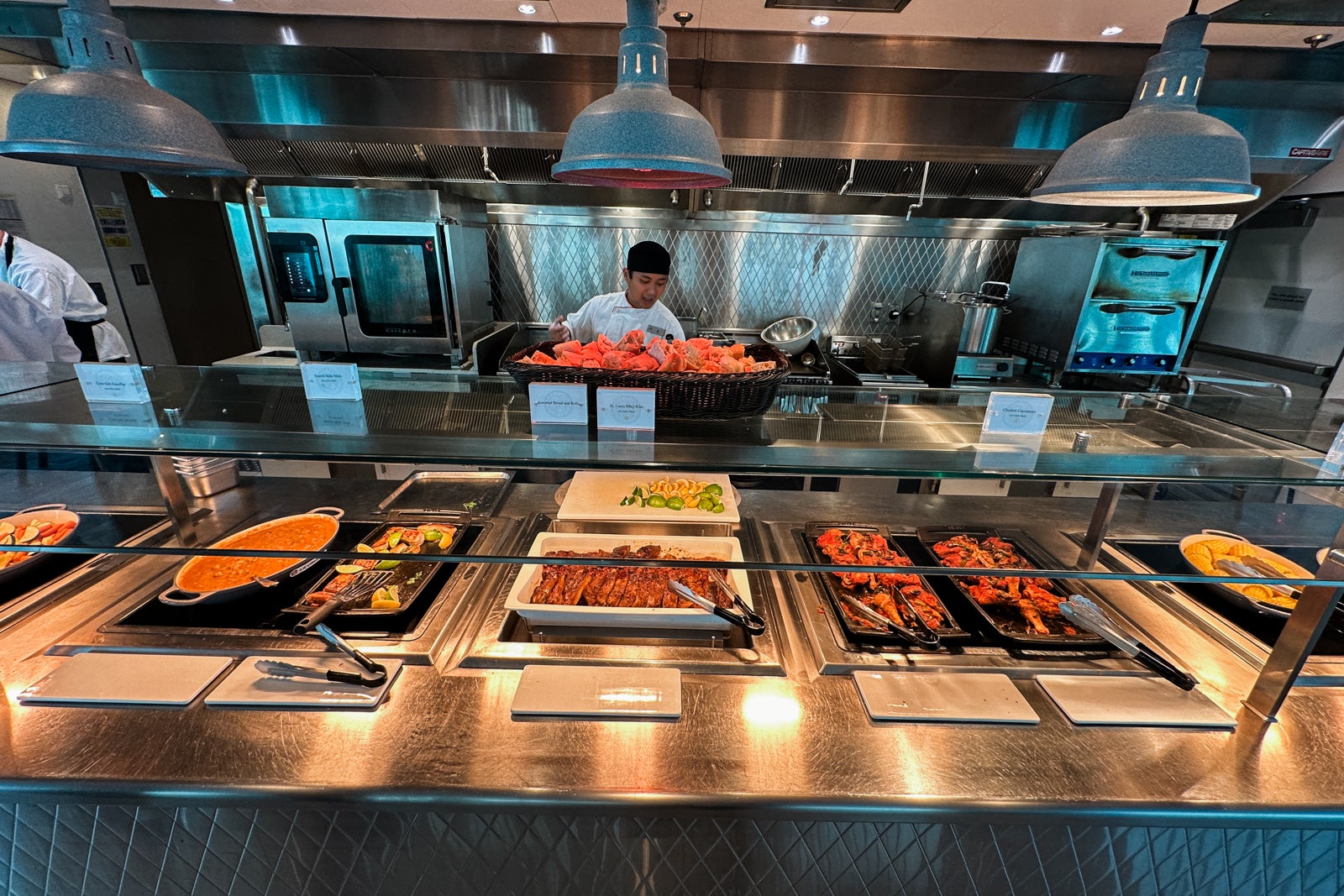 A line of buffet food on a cruise ship