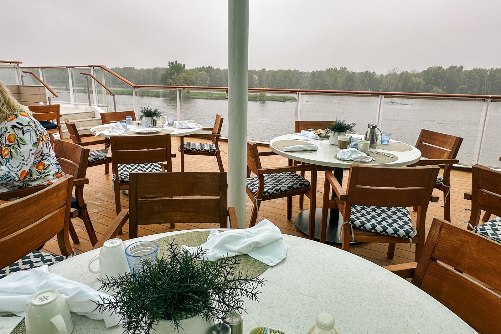 Dirty alfresco tables on a cruise ship