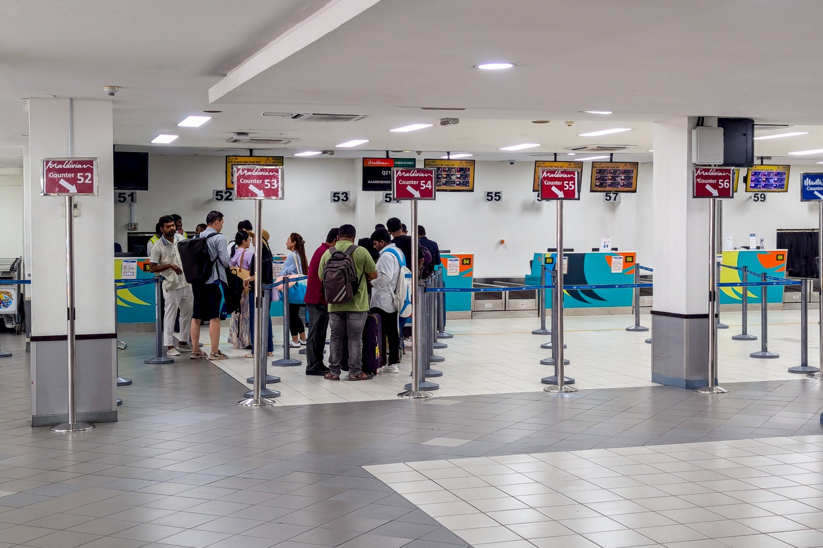 Check in for a domestic flight in the Maldives