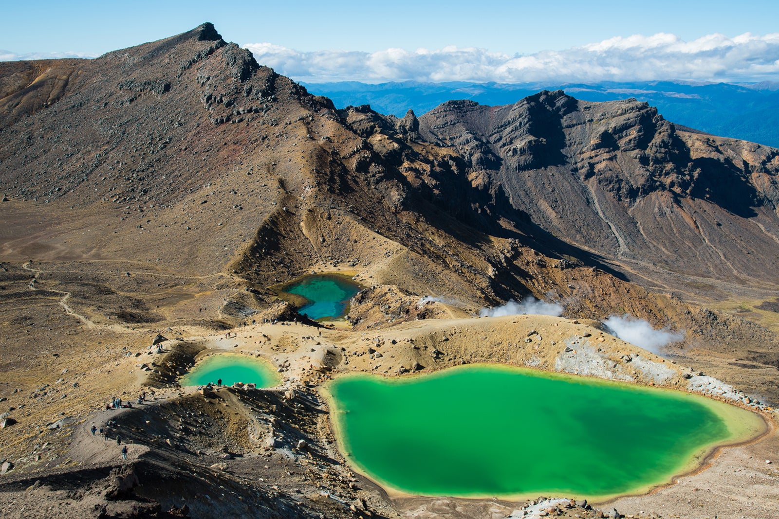 Green lakes in craters on top of a mountain in New Zealand