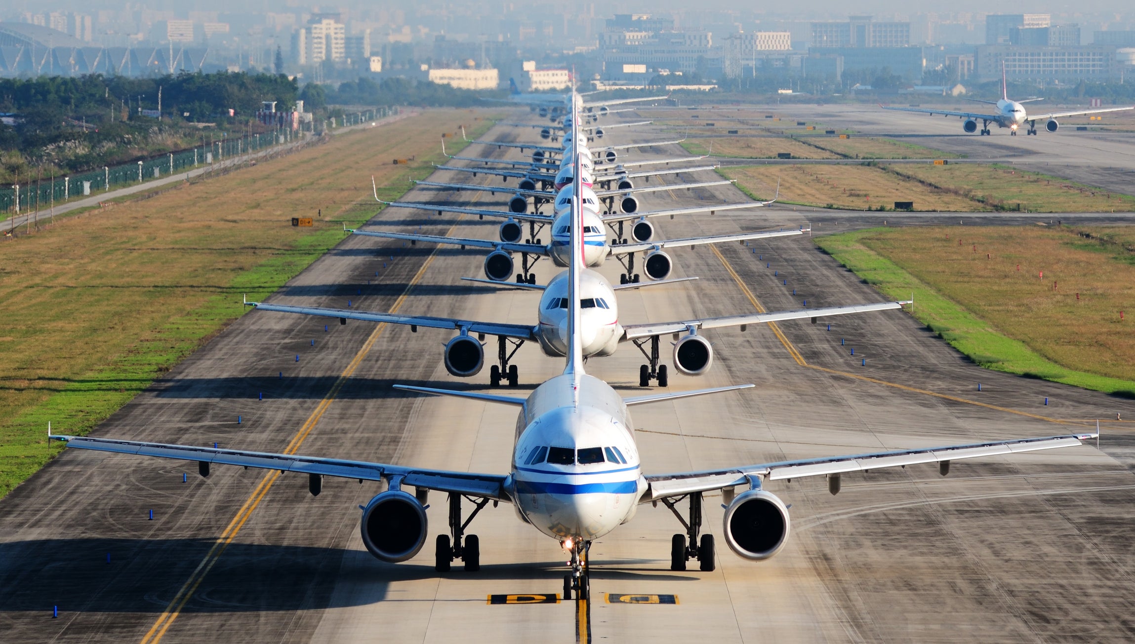 Planes lined up on a tarmac