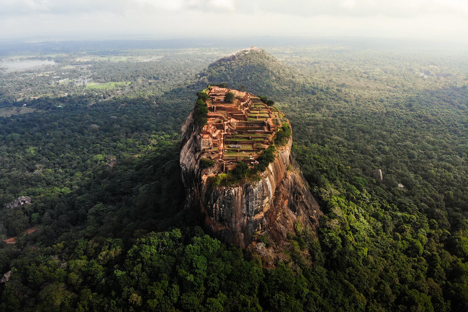 aerial view of city built on top of a rock in Sri Lanka surrounded by forest