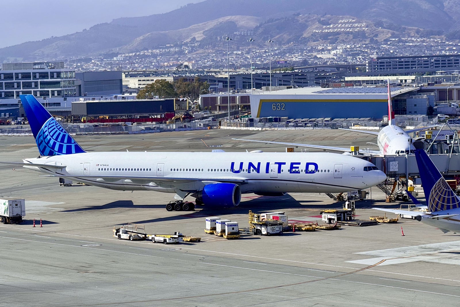 United plane parked at a gate