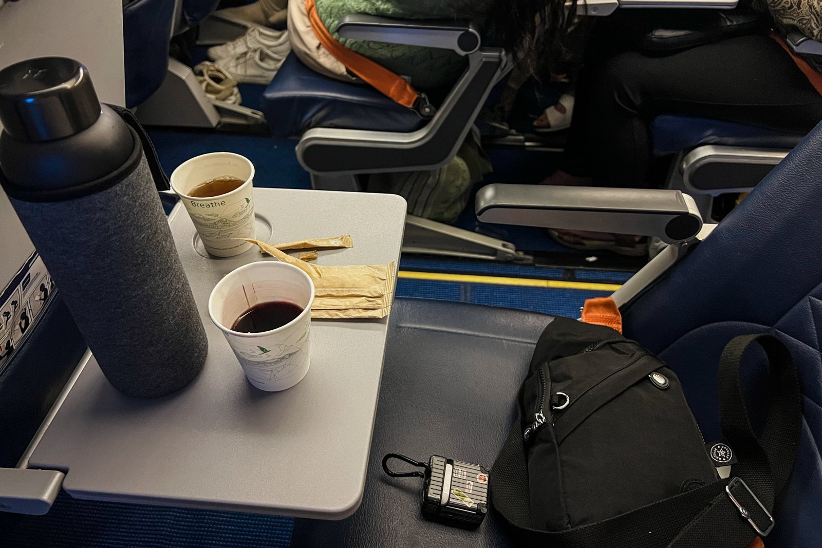 Empty seat tray used for drinks on Azores Airlines flight