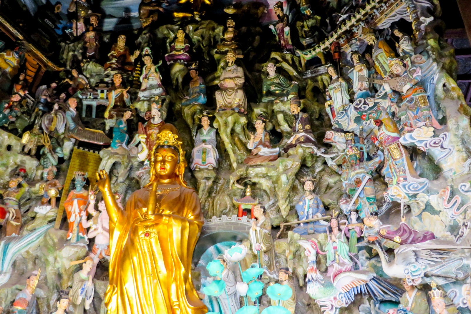 A wall of dieties at a thousand-year-old Buddhist temple in China