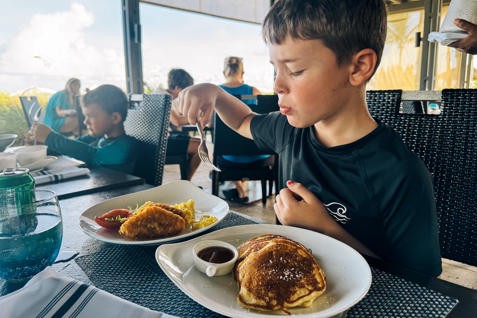 Boy eating pancakes