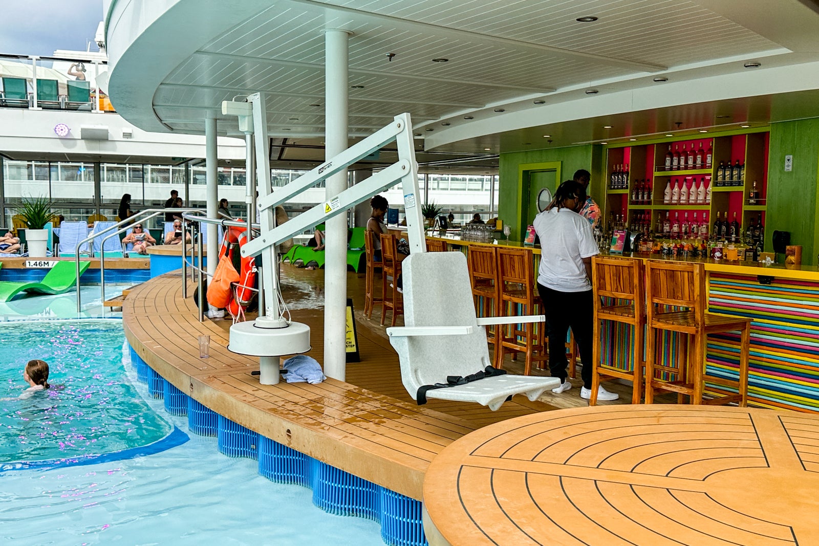 A chair lift at a cruise ship pool