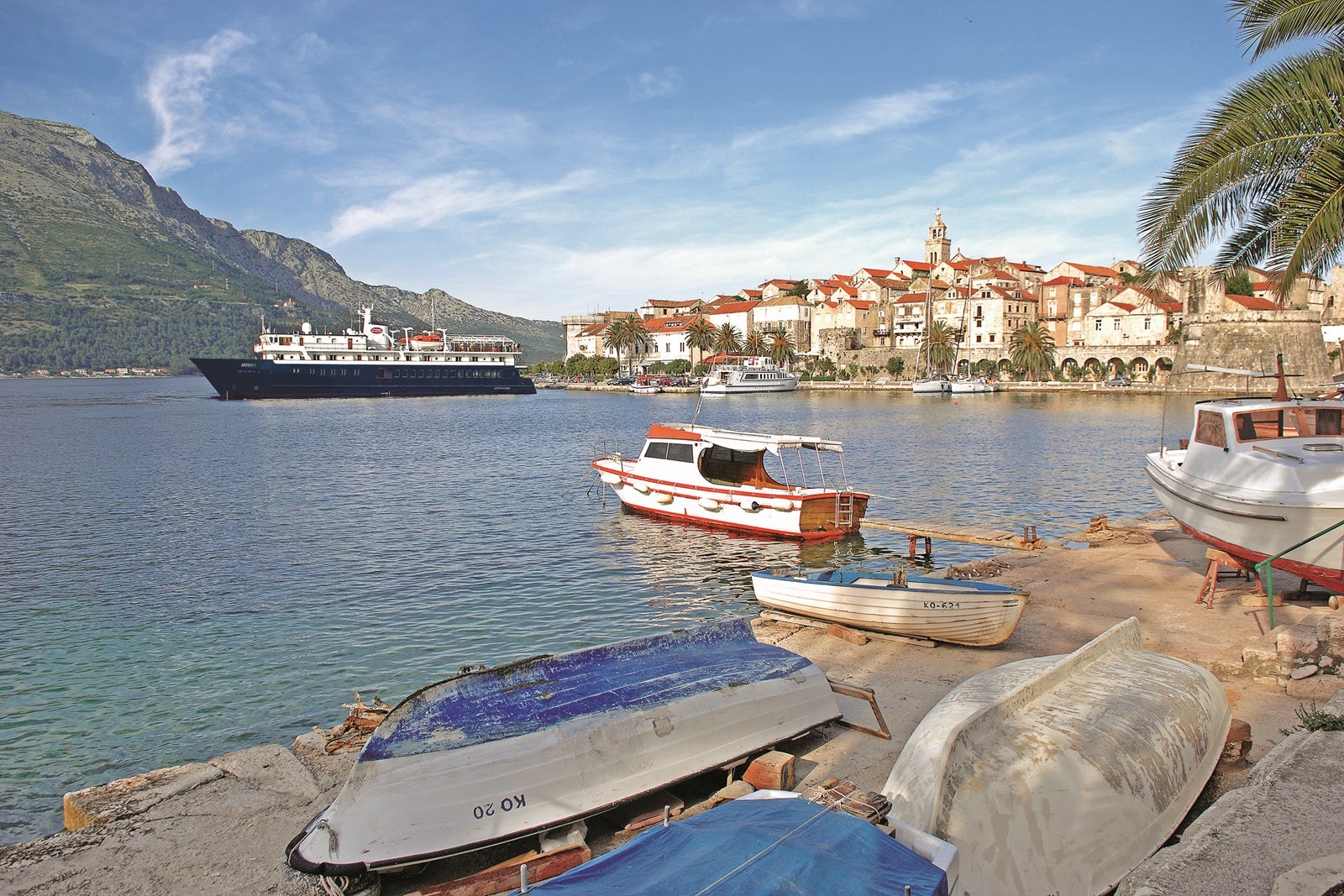 A small cruise ship anchored near Korcula