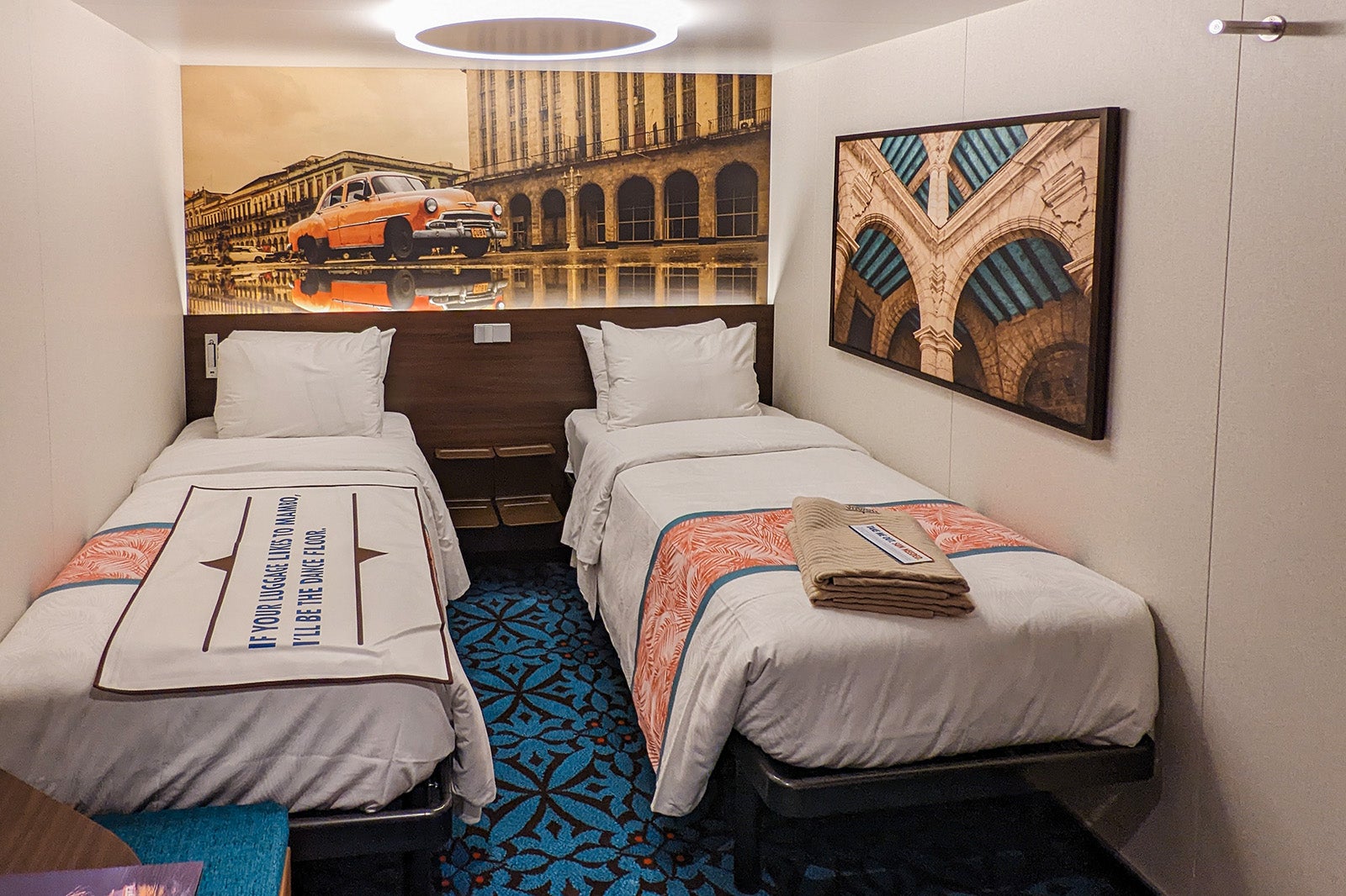 Inside cruise cabin with Cuba themed artwork