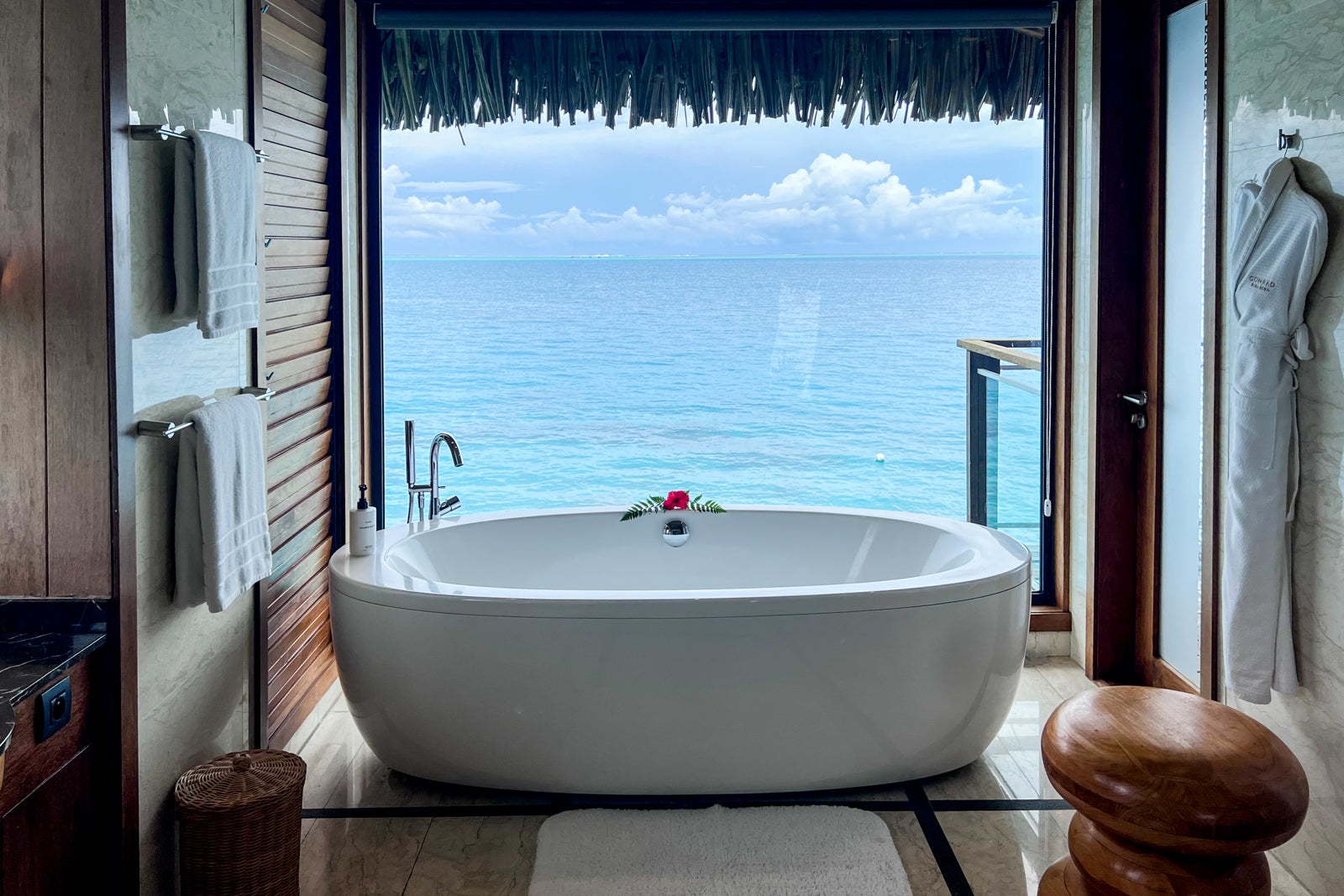 bathtub overlooking water