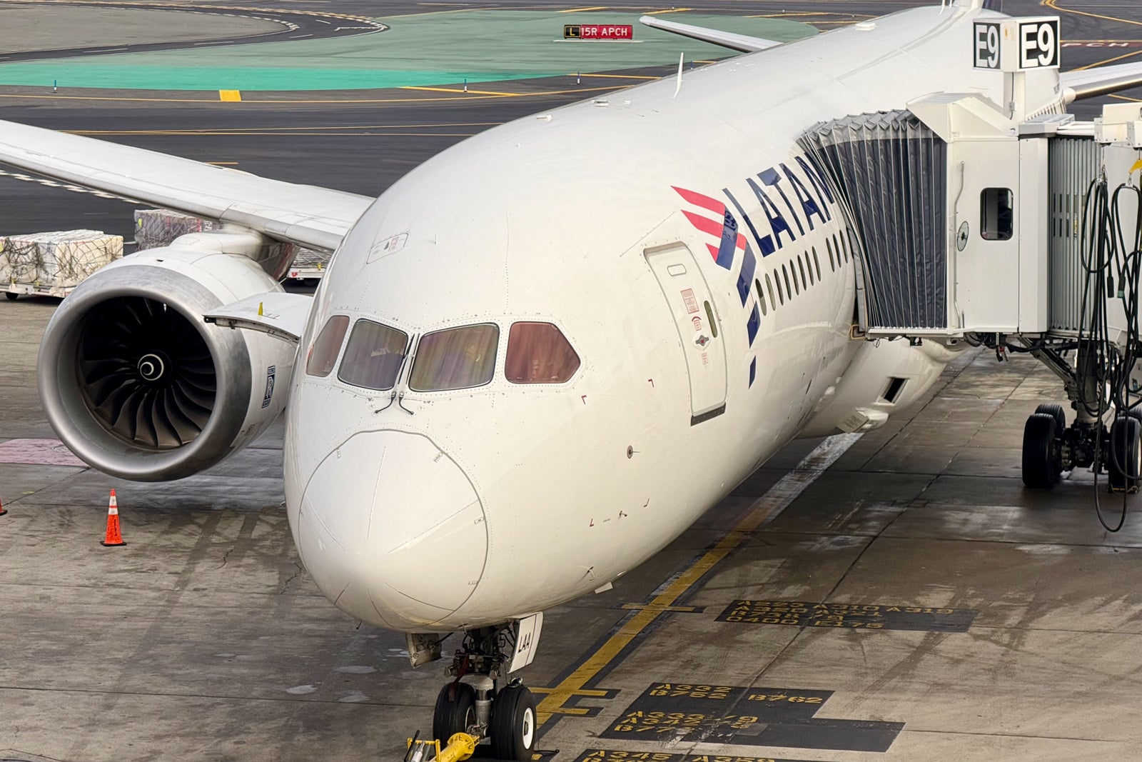 Latam airplane parked at the gate