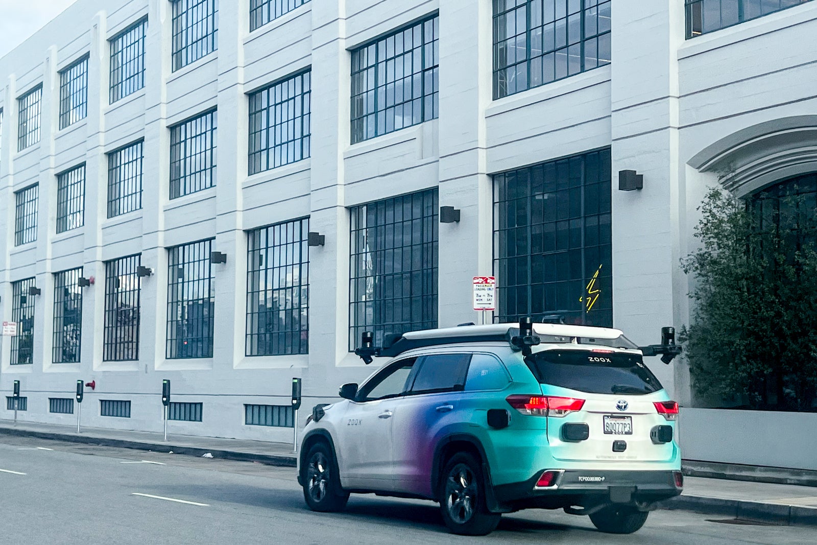 Zoox hybrid car testing driving in San Francisco in December of 2024.