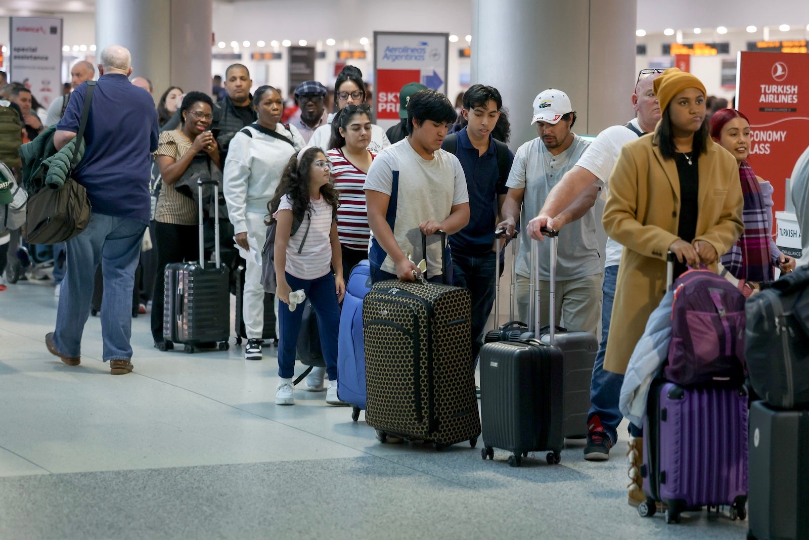 people in line for security