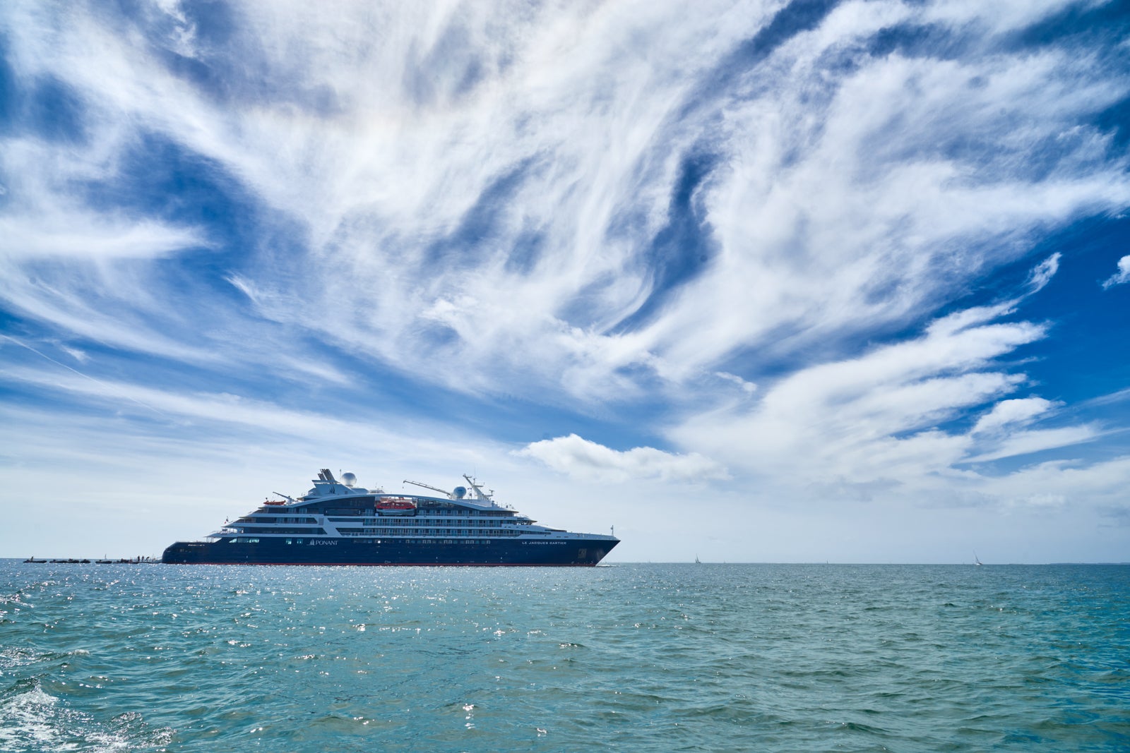 A Ponant ship in the middle of the ocean