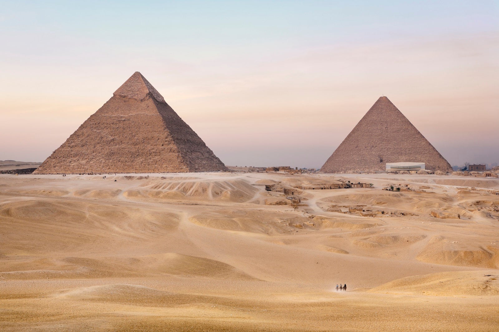 Cairo, Egypt, Africa. Pyramids of Giza. The Pyramid of Menkaure (Mycerinus) left and Pyramid of Khafre (Chephren) right. Twilight (twilite)