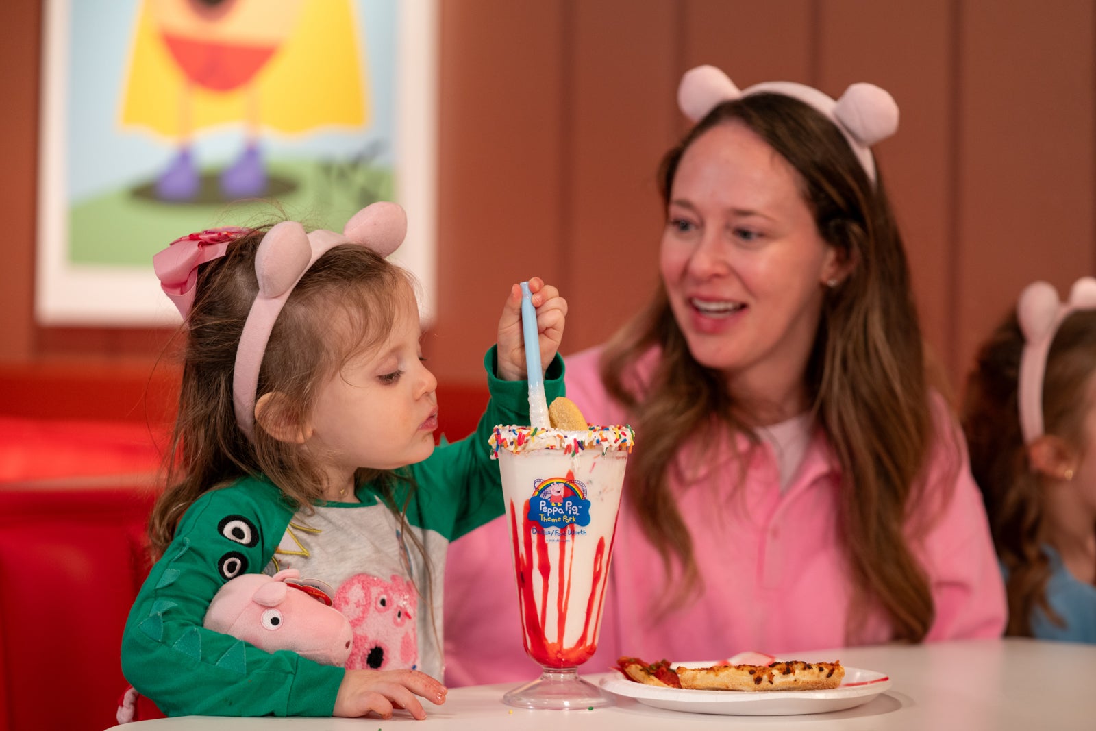 child drinking milkshake