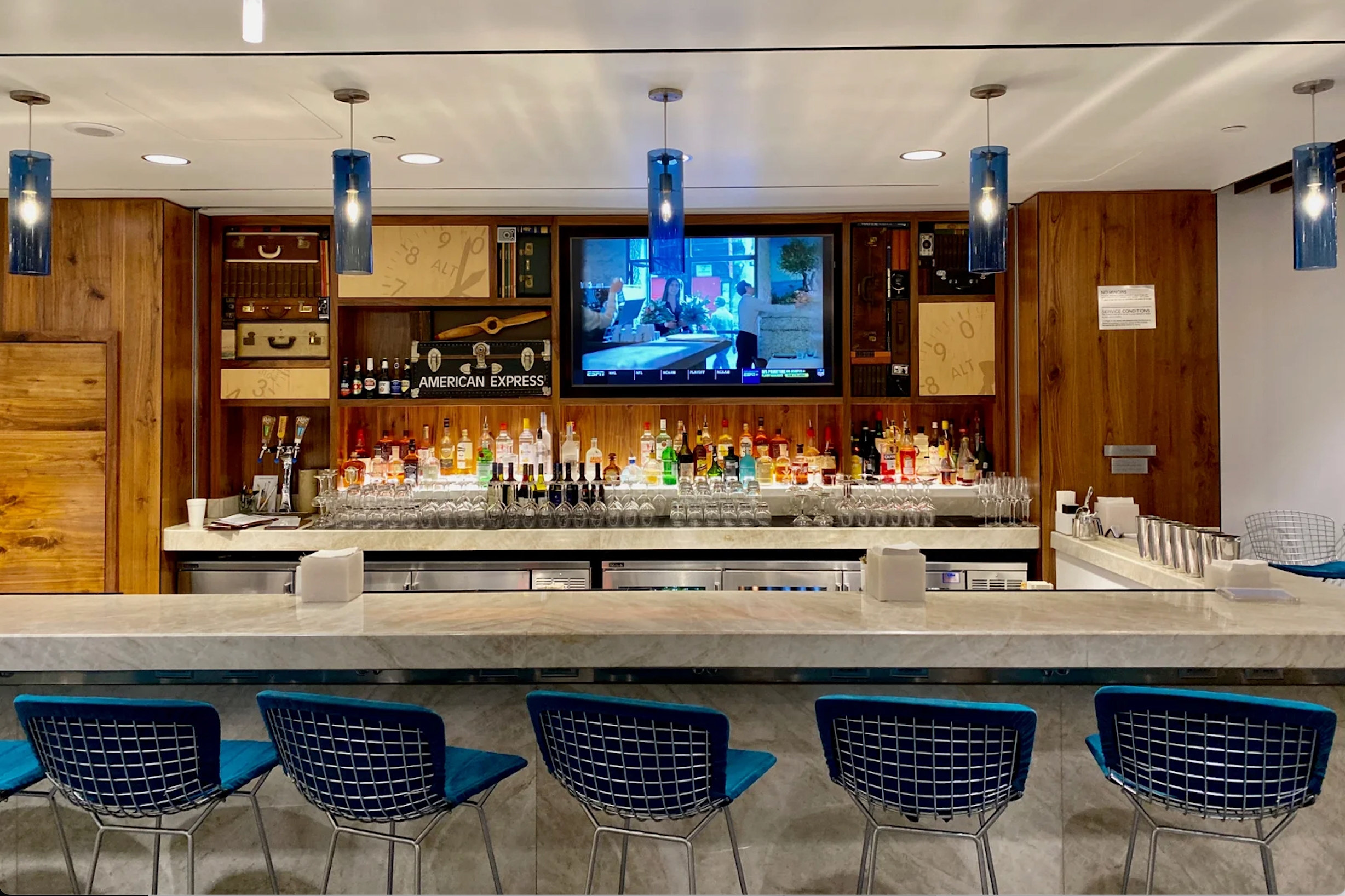 Bar and TV at DFW Centurion lounge