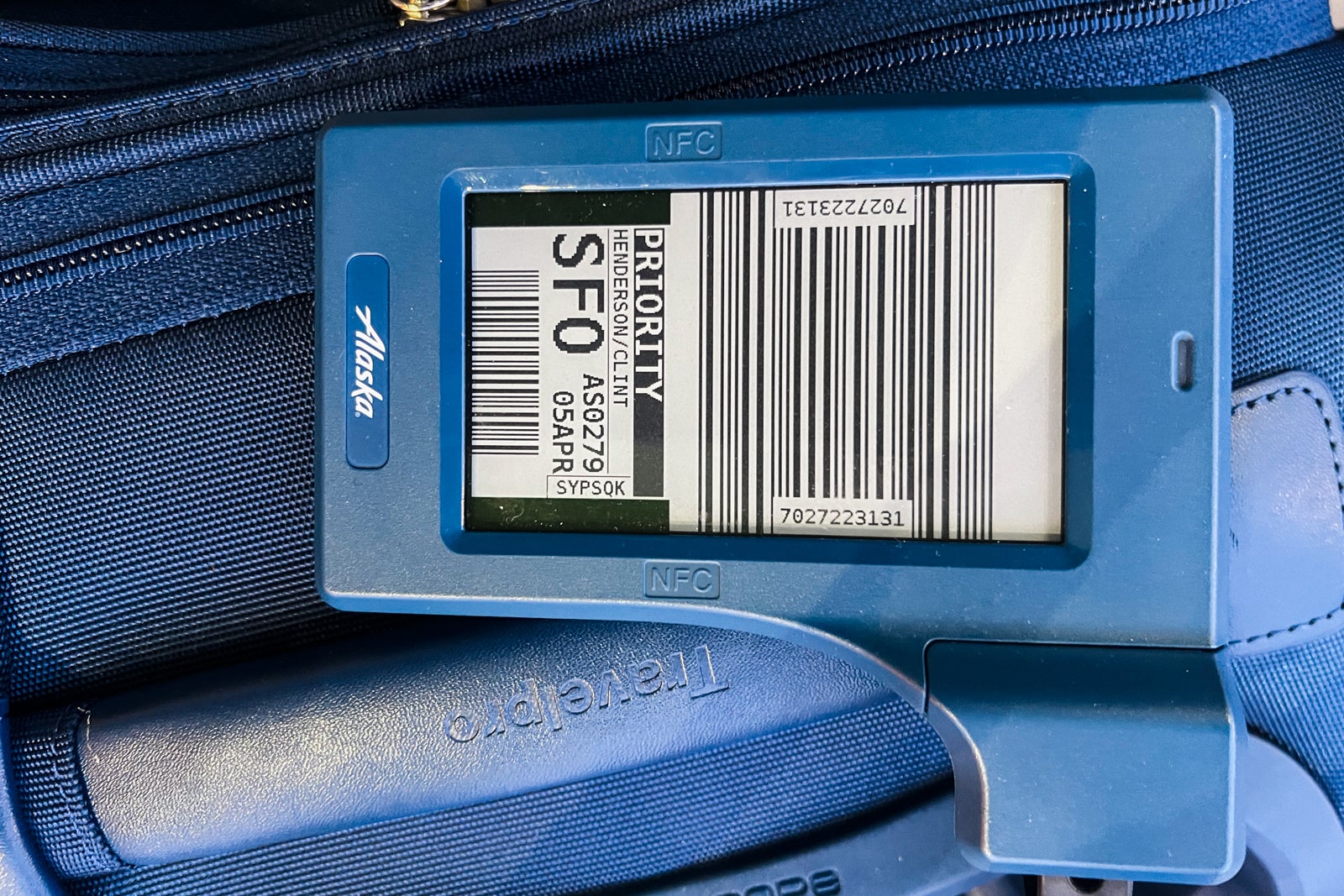 suitcase with digital bag tag