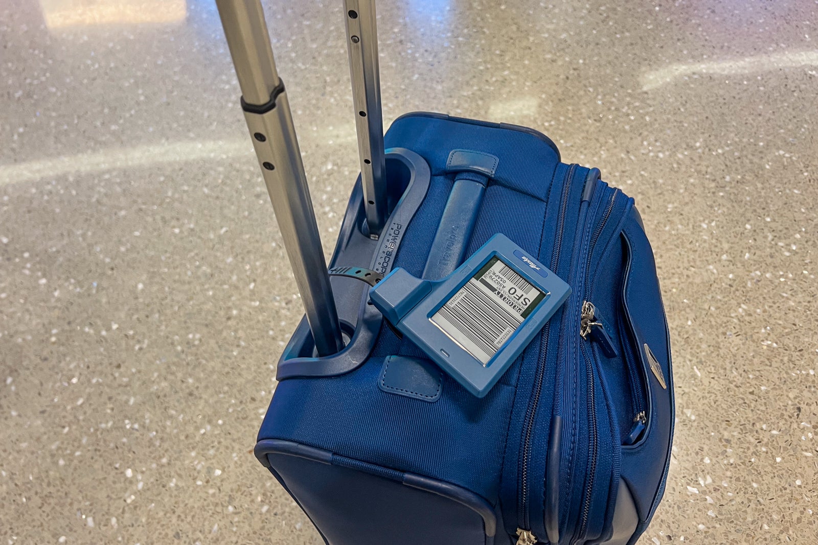 suitcase with digital bag tag