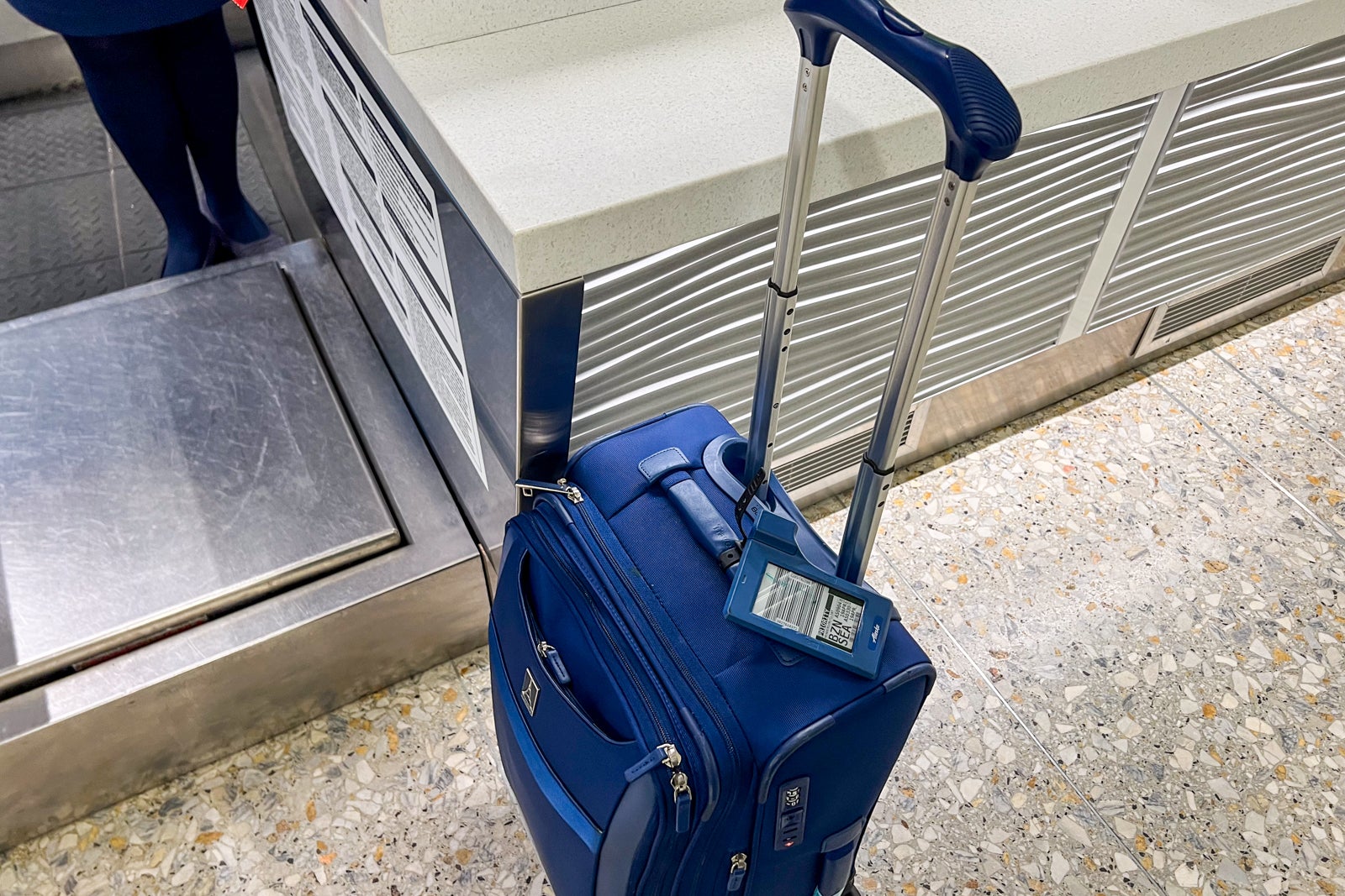 suitcase with digital bag tag