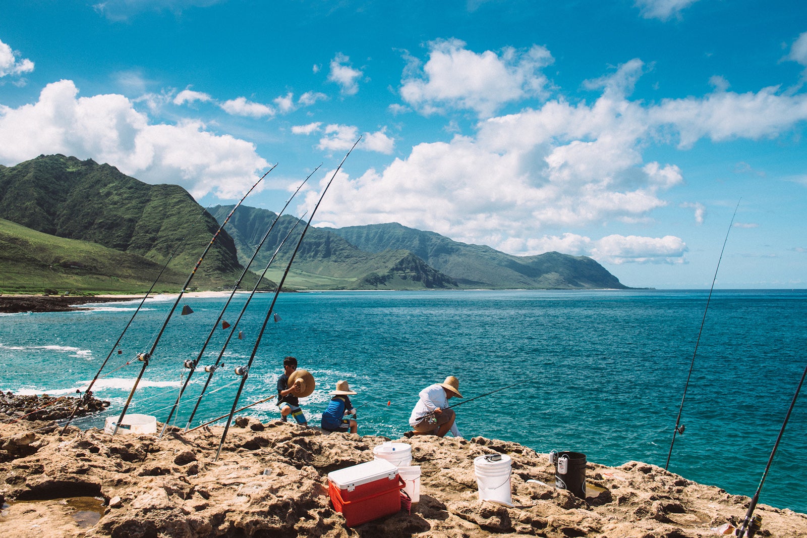 Hawaiian Family Fishing at Ka'ena Point in Oahu