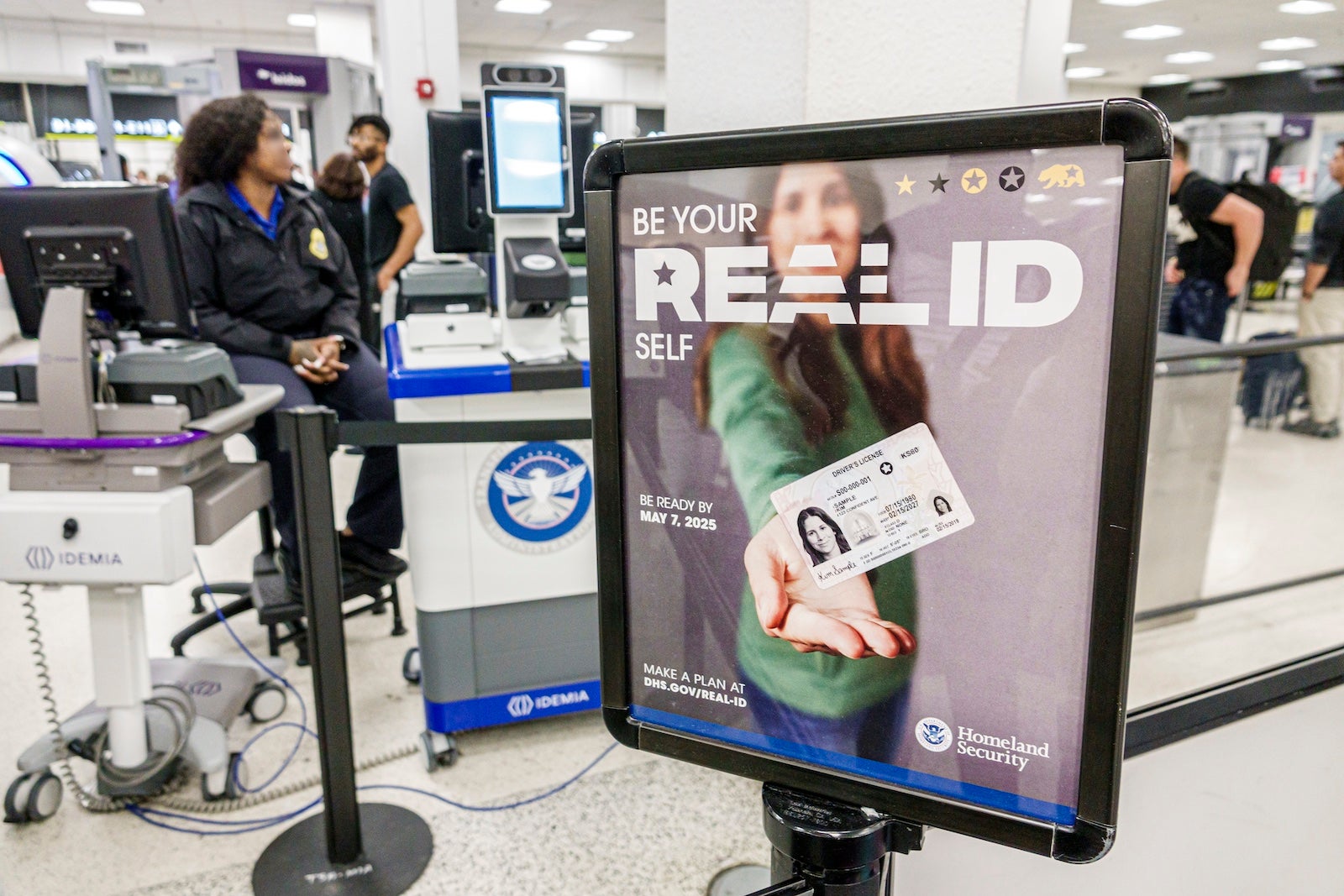 Signs warn of the impending Real ID deadline at Miami International Airport (MIA). 