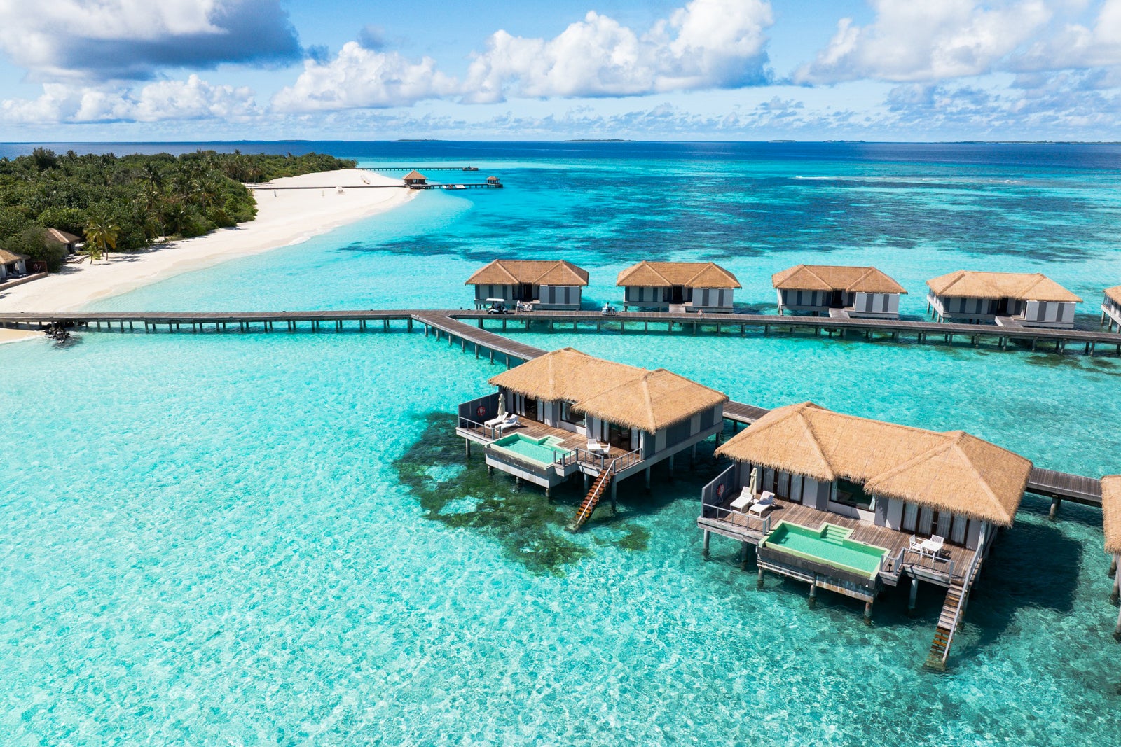 Overwater villas at the Vignette Collection Noku Maldives