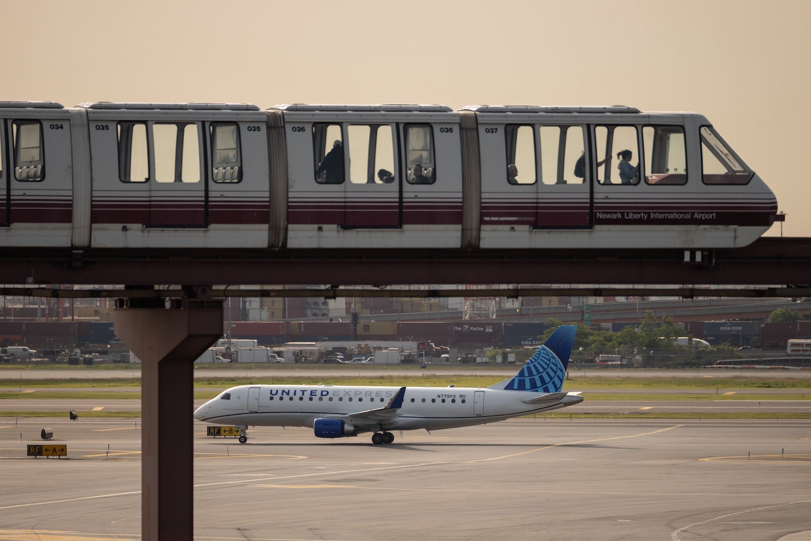 A United Express regional jet taxis at Newark Liberty International Airport (EWR)